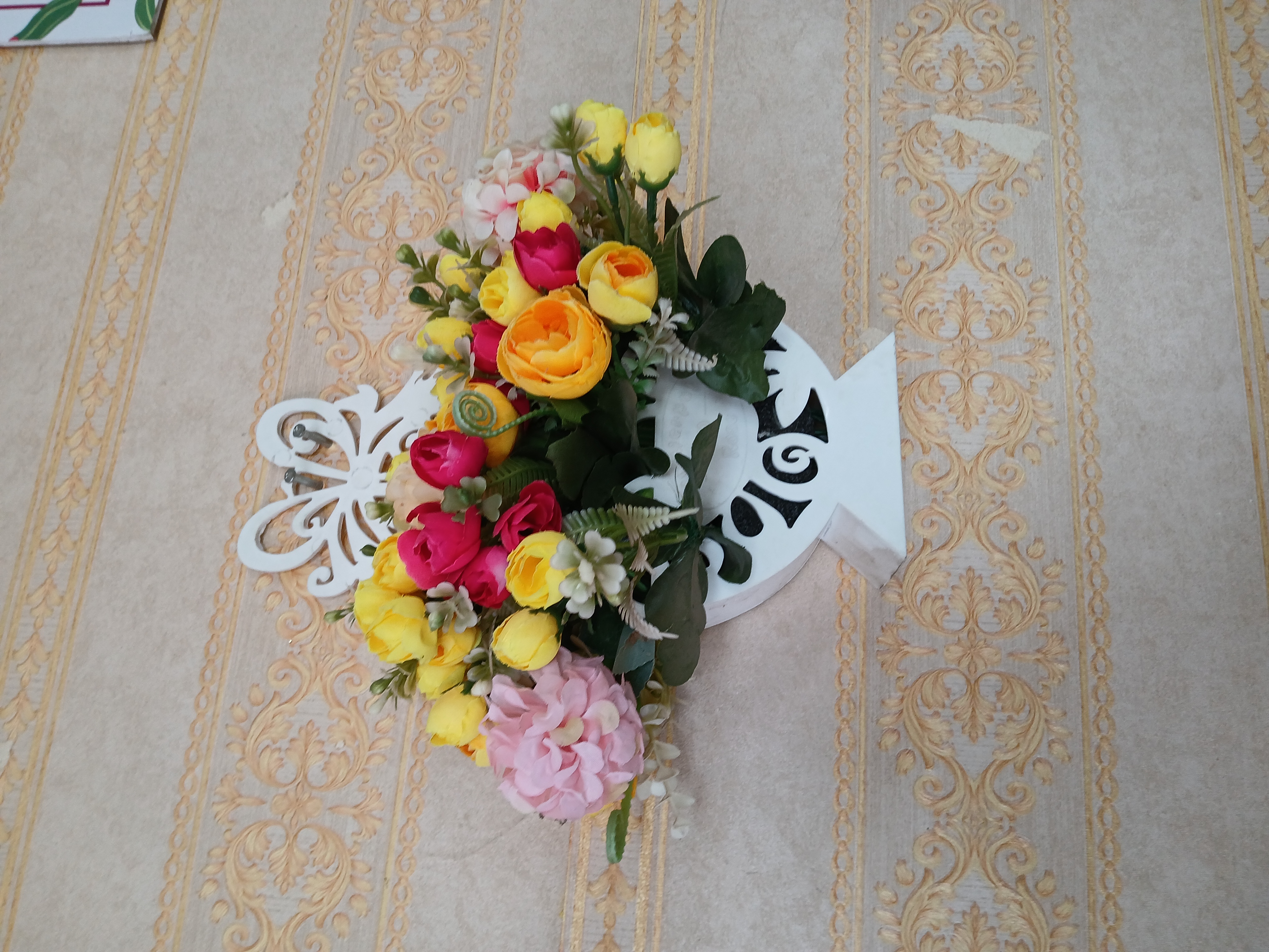 Artificial Flower In Plastic Wall Vase Image