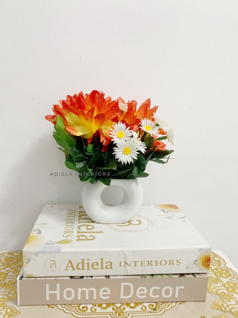 Potted Flower In Half Donut Vase Image
