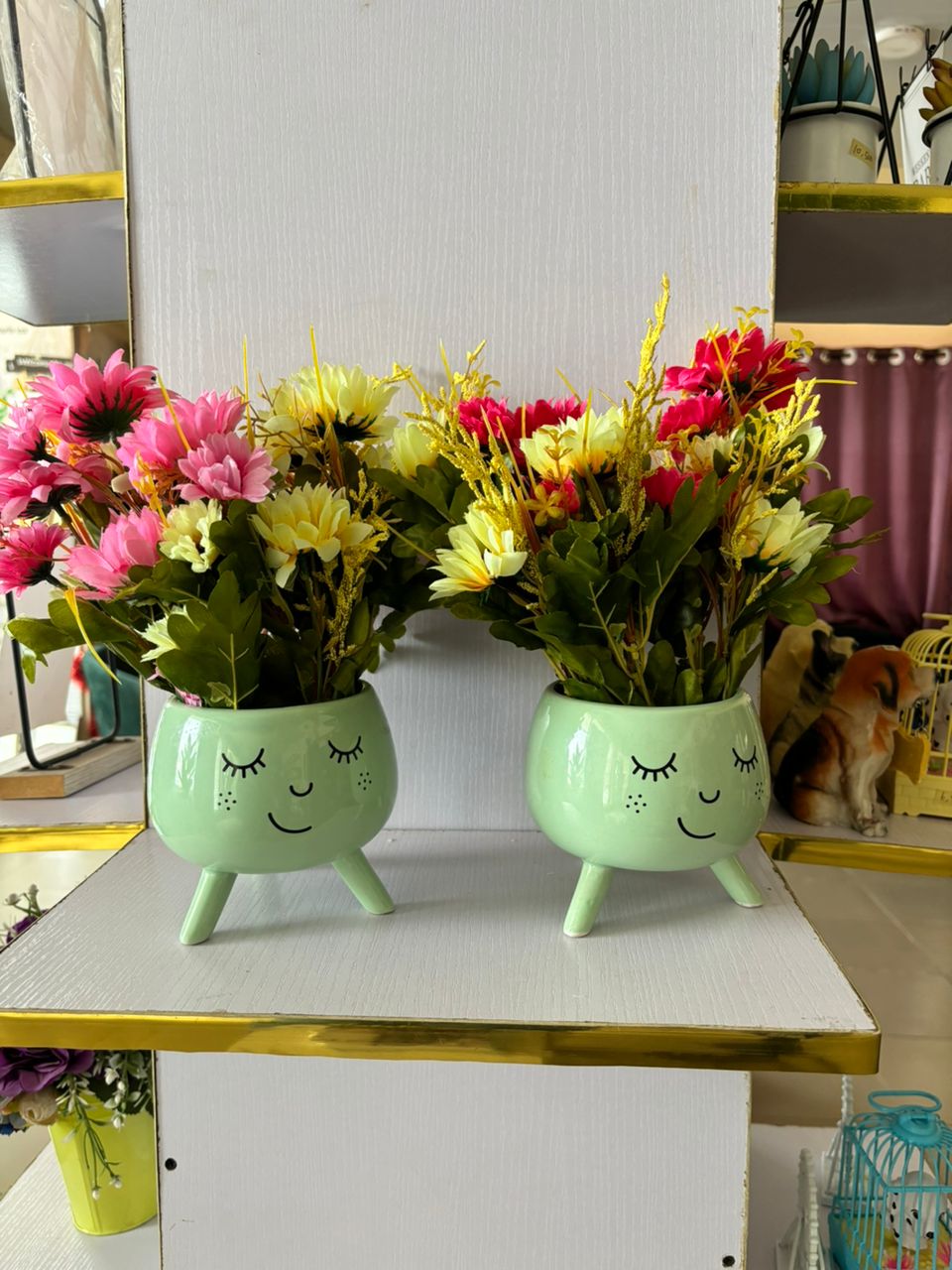 Multicolored Sunflower In Smily Face Vase Image