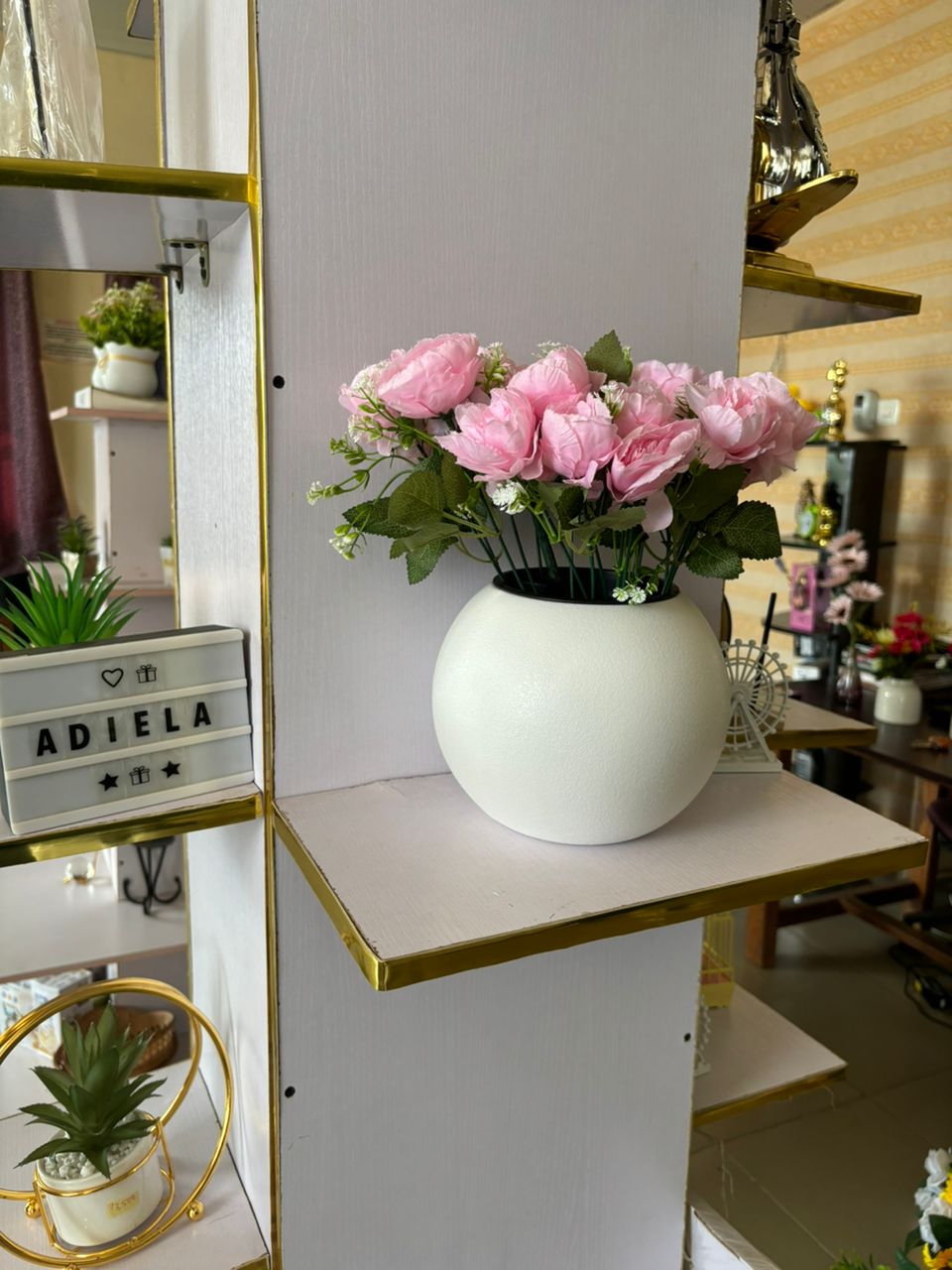 Artificial Flower In Plastic Table Planter Image