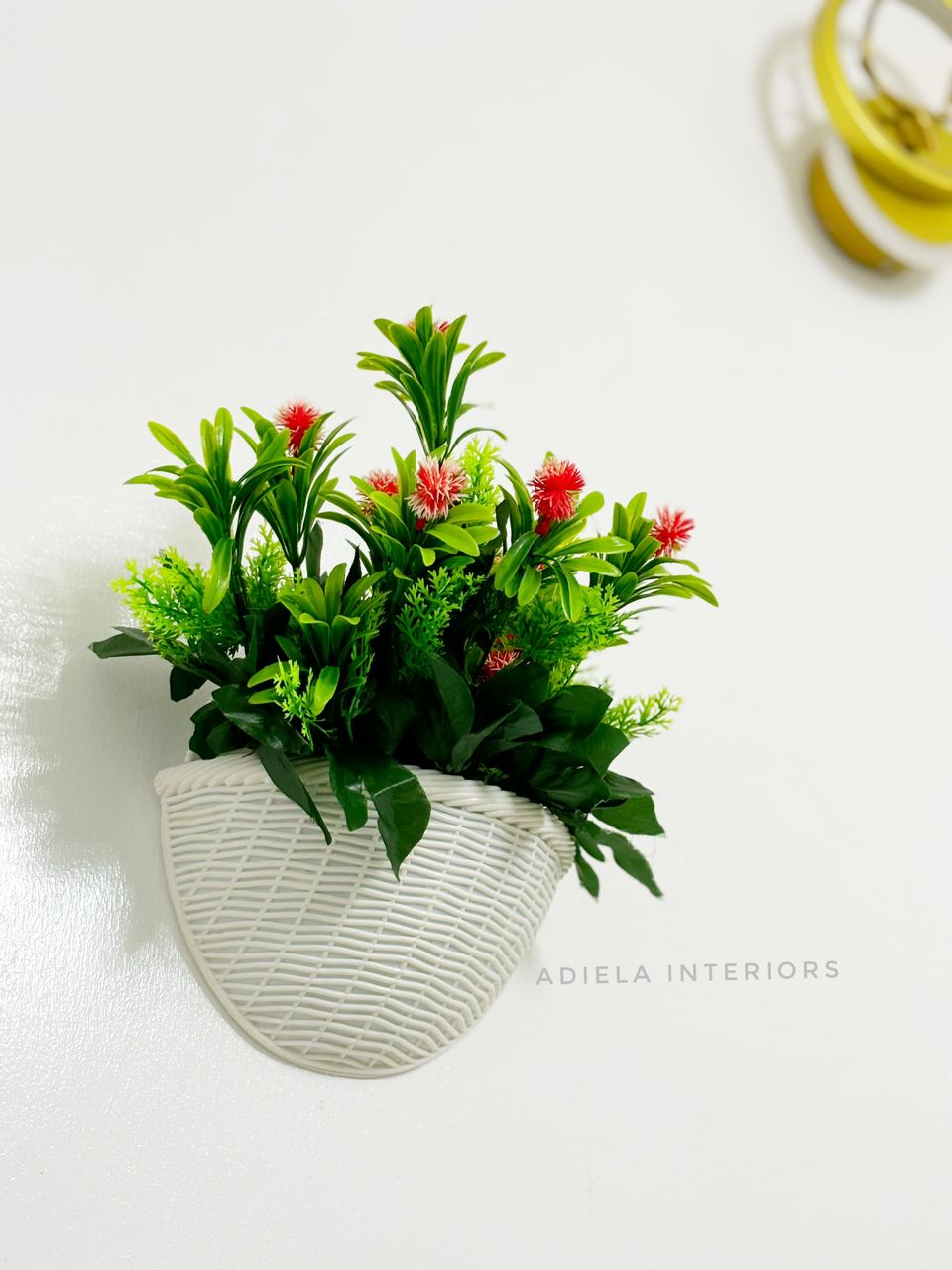 Artificial Flower In Plastic Wall Vase Image
