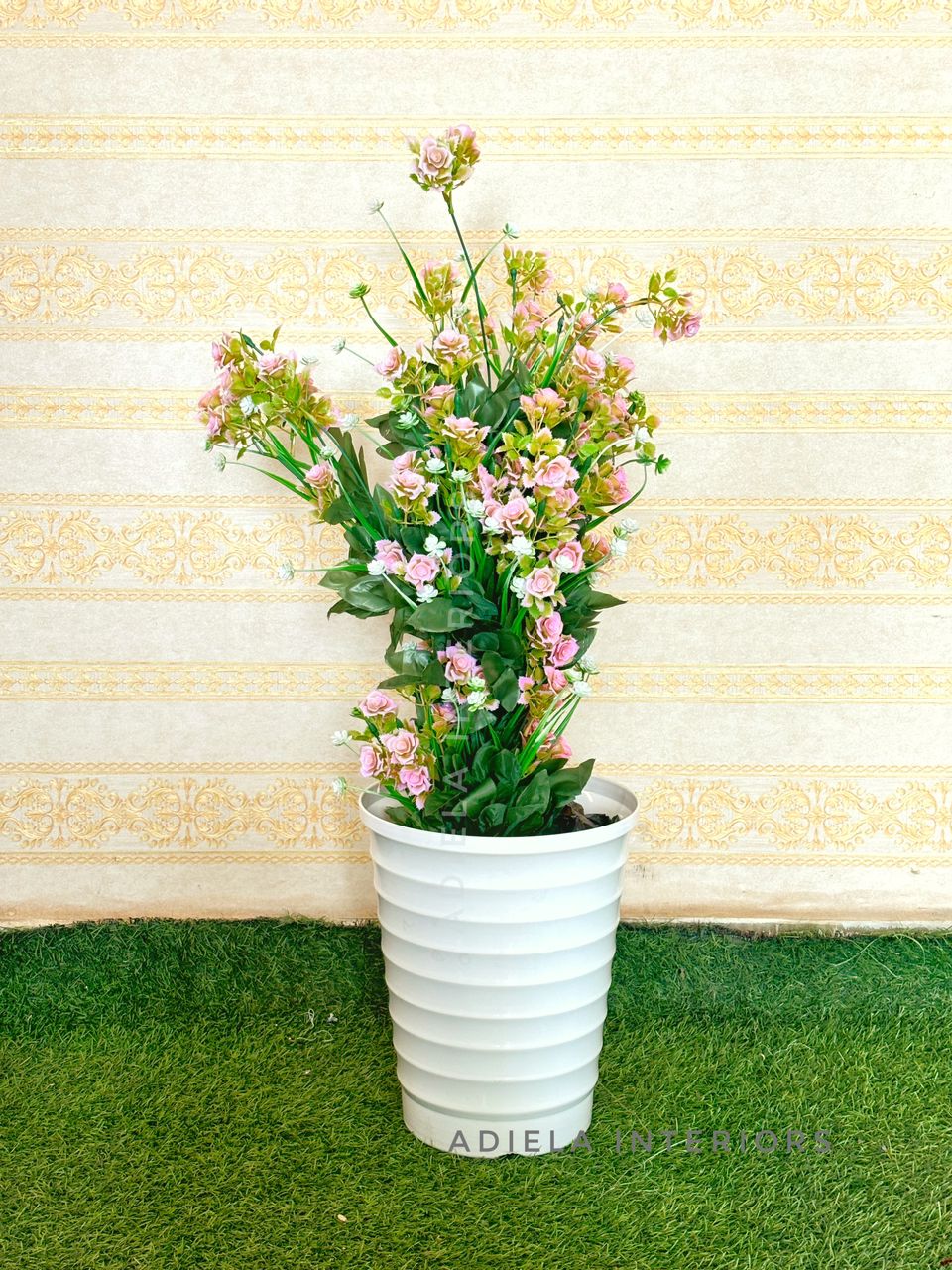 Artificial Flower In Plastic Vase Image