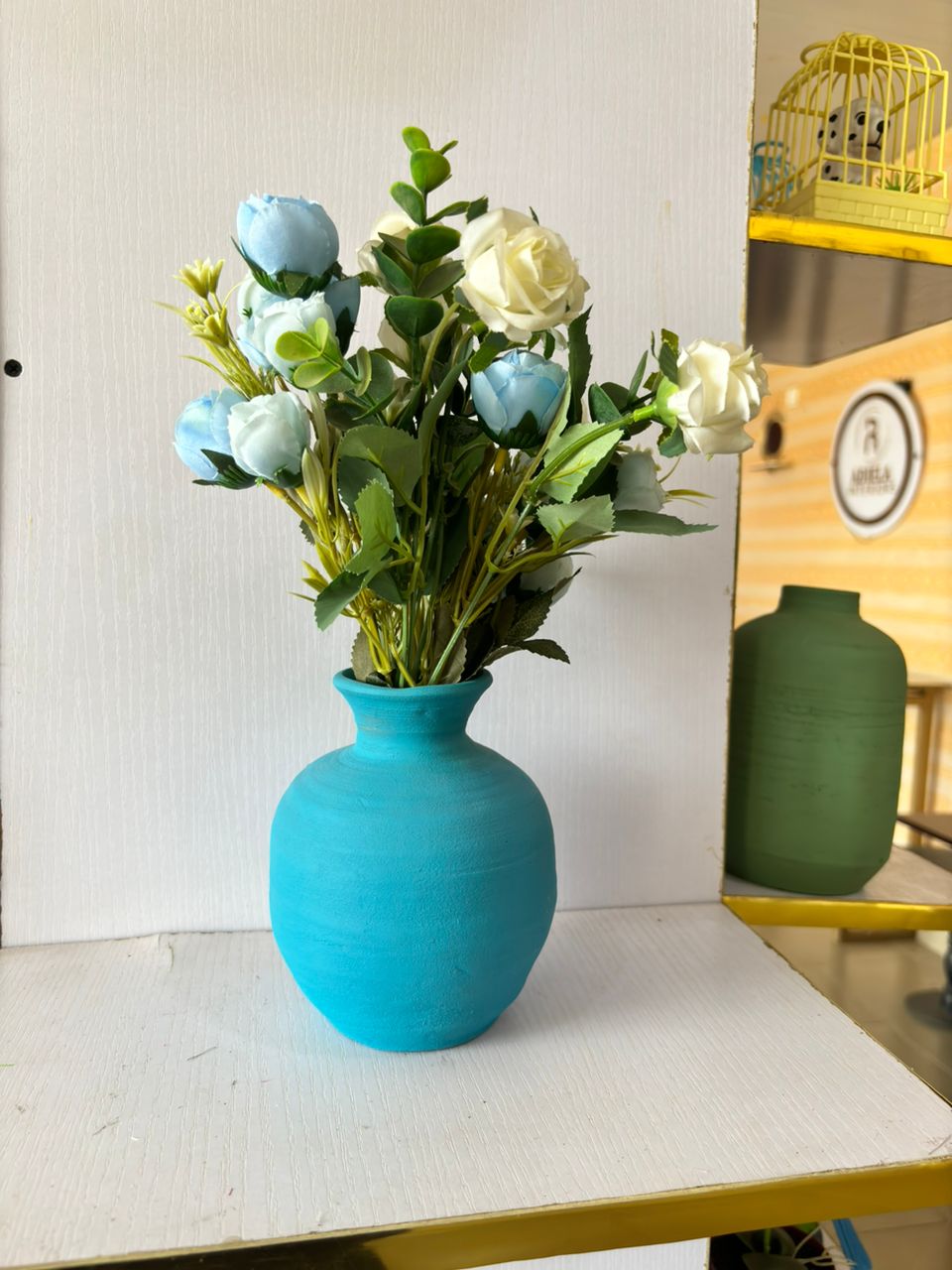 Artificial Flower in ceramic Vase Image