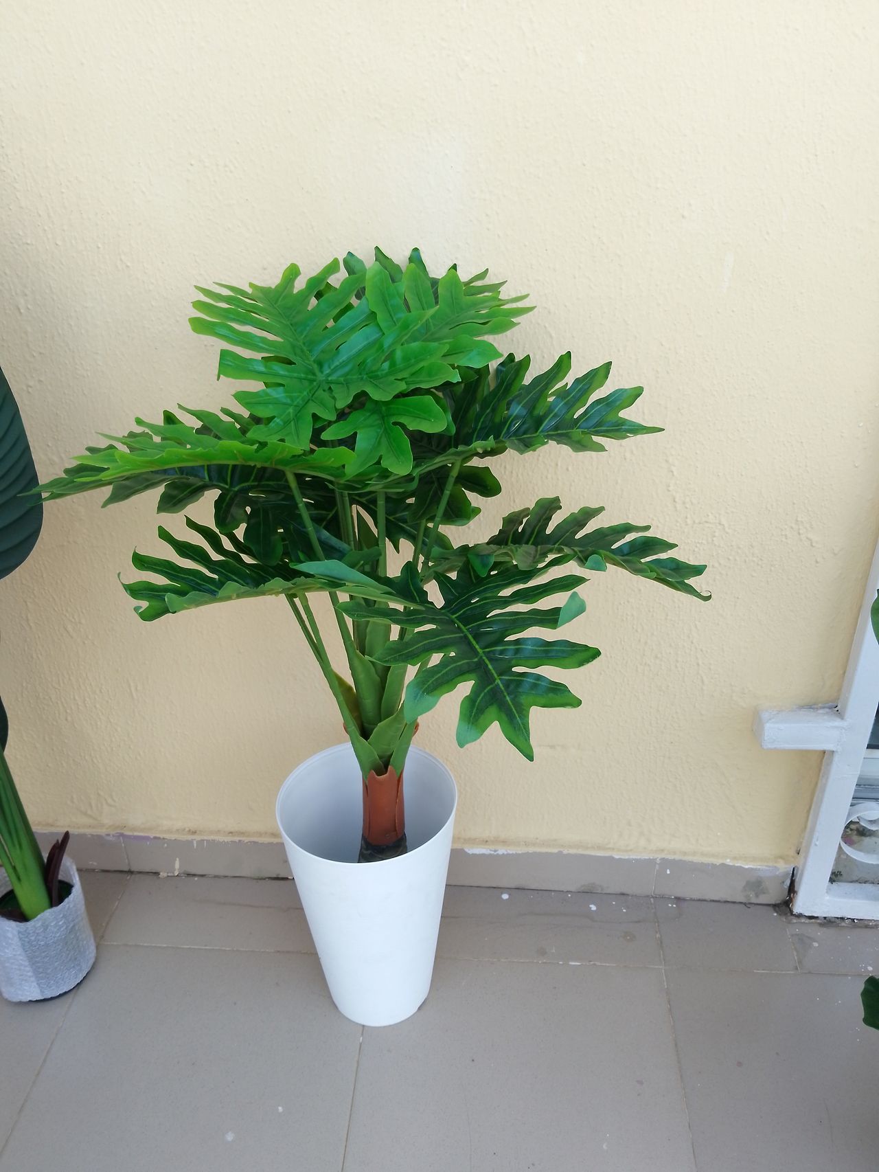 Artificial Tree In Plastic planter Image