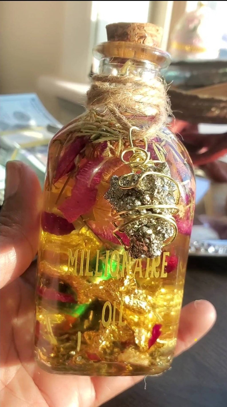 MILLIONAIRE Oil | Prepared with 100% pure oils, Herbs,Money & Crystals to Attract Wealth and Riches. Charged with Prosperity Mantras. image