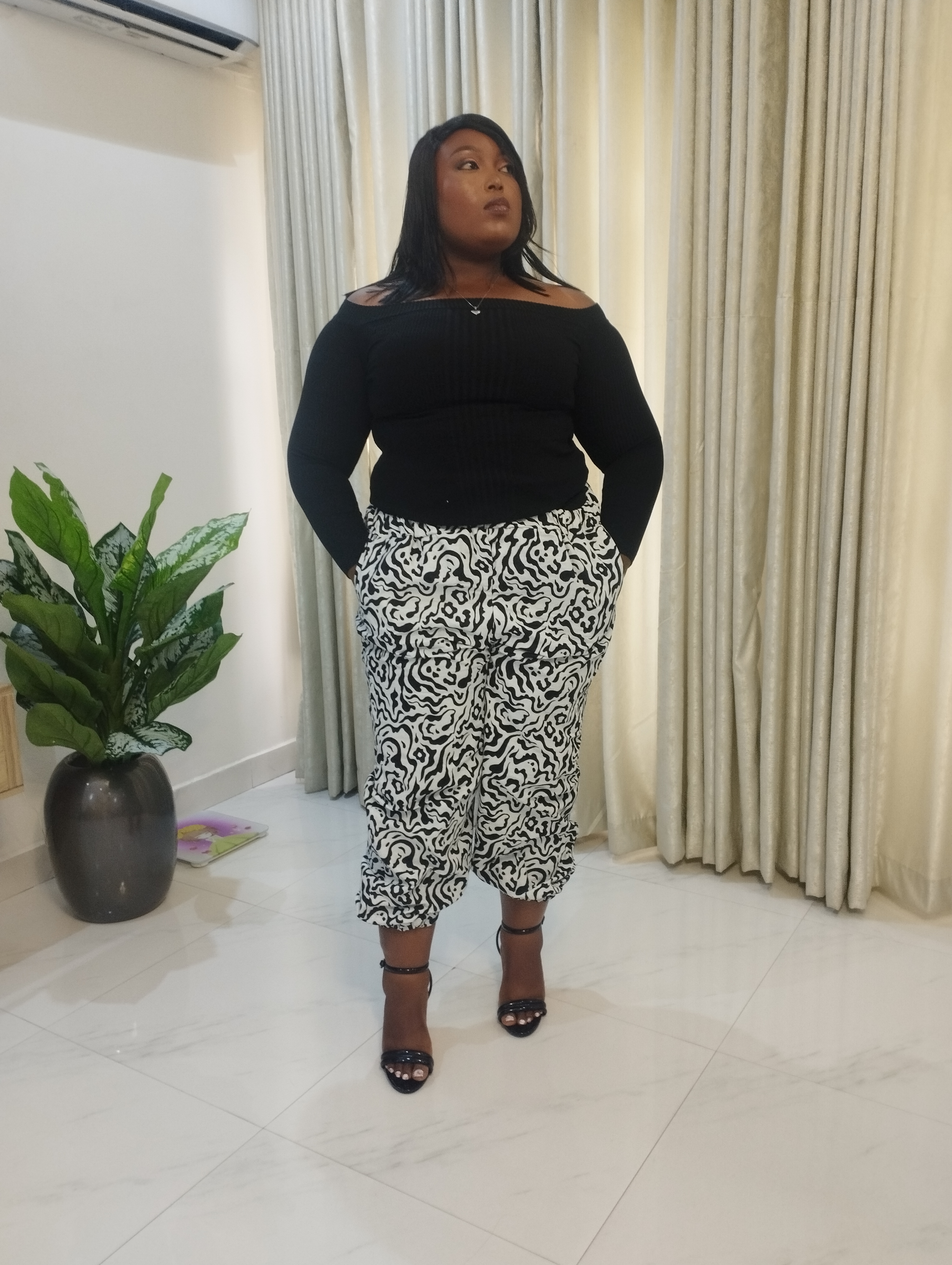 White and black ankara carrot trouser image
