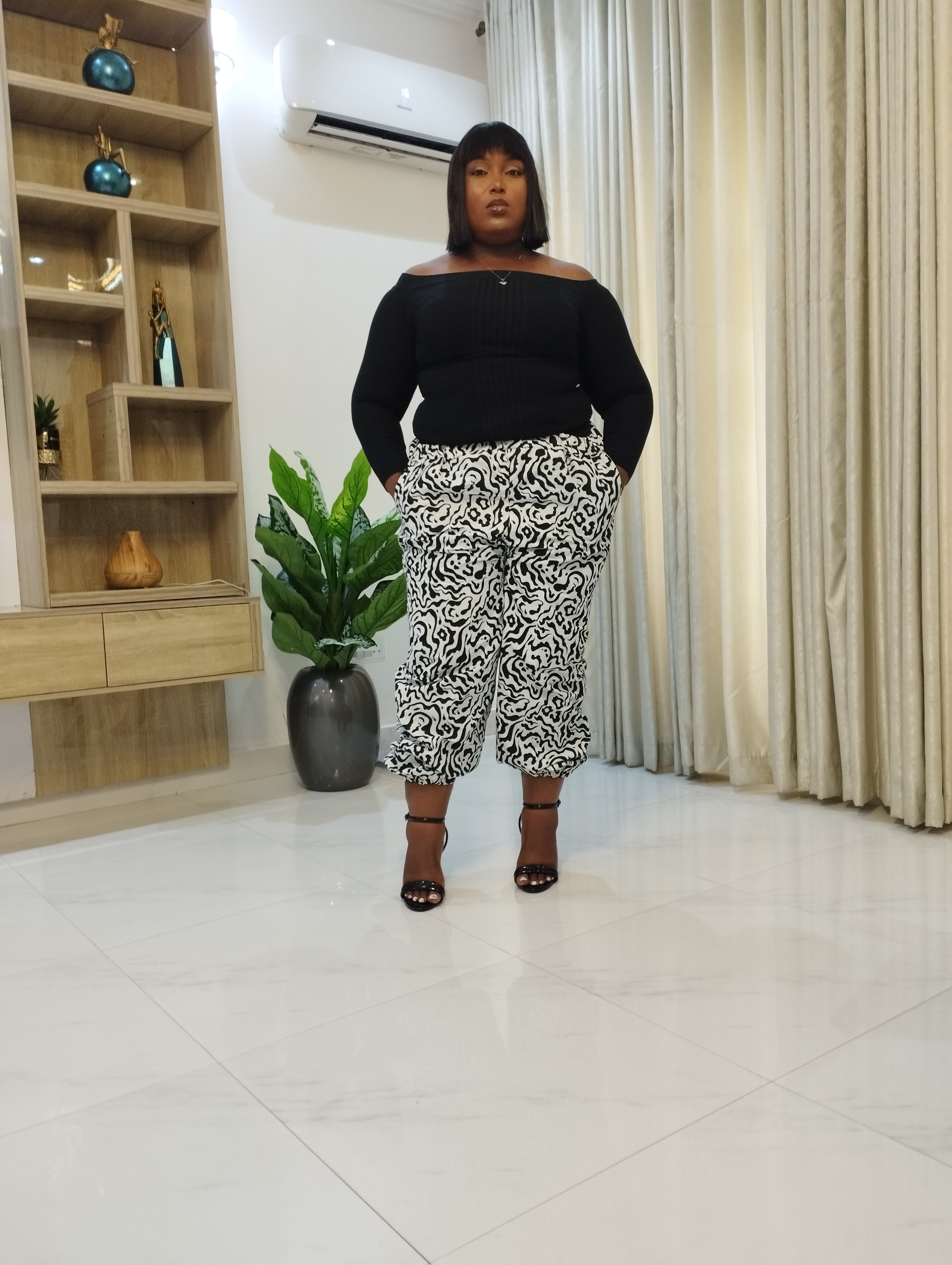 White and black ankara carrot trouser image