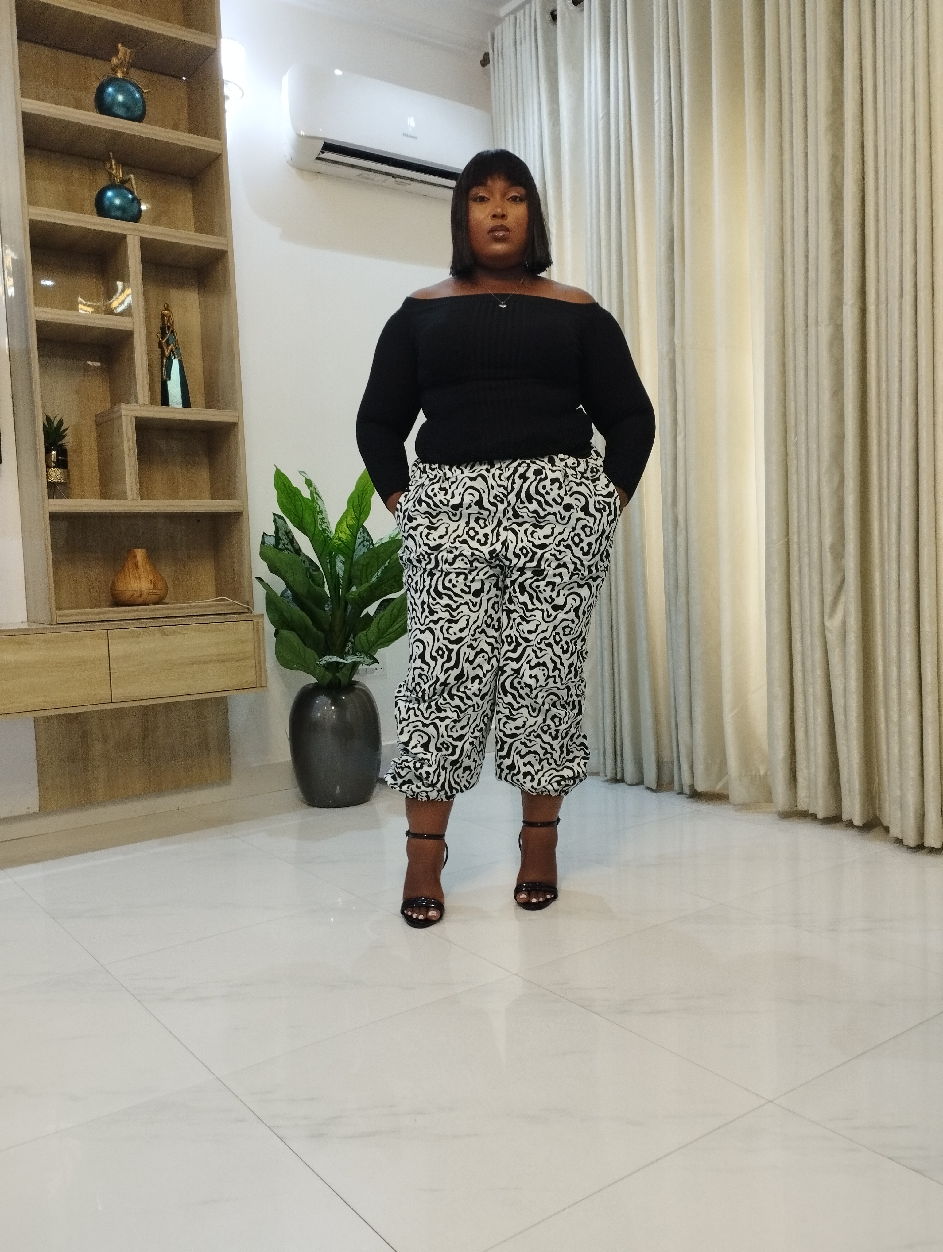 White and black ankara carrot trouser image