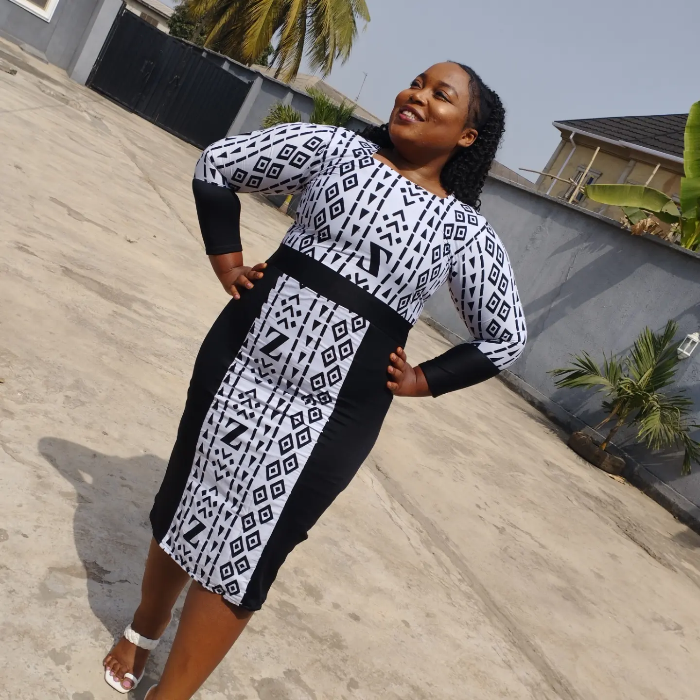 White and black official ankara gown